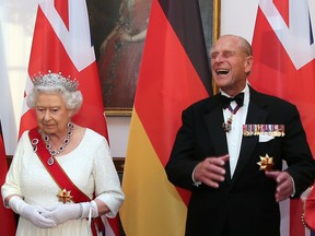 Britain's Queen Elizabeth and Prince Philip wait to greet guests prior to a state banquet at Bellevue presidential palace in Berlin, Germany on June 24, 2015.