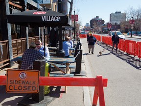 Customers enjoy the patio at Comery Block Barbecue along 17th Avenue S.W. on Thursday, April 15, 2021. The City of Calgary has been inundated with patio permit requests this spring.