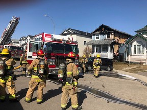 The Calgary Fire Department on the scene of a house fire in Monterey Park on Friday, April 16, 2021.