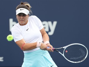 Apr 3, 2021; Miami, Florida, USA; Bianca Andreescu of Canada hits a backhand against Ashleigh Barty of Australia (not pictured) in the women's singles final in the Miami Open at Hard Rock Stadium.
