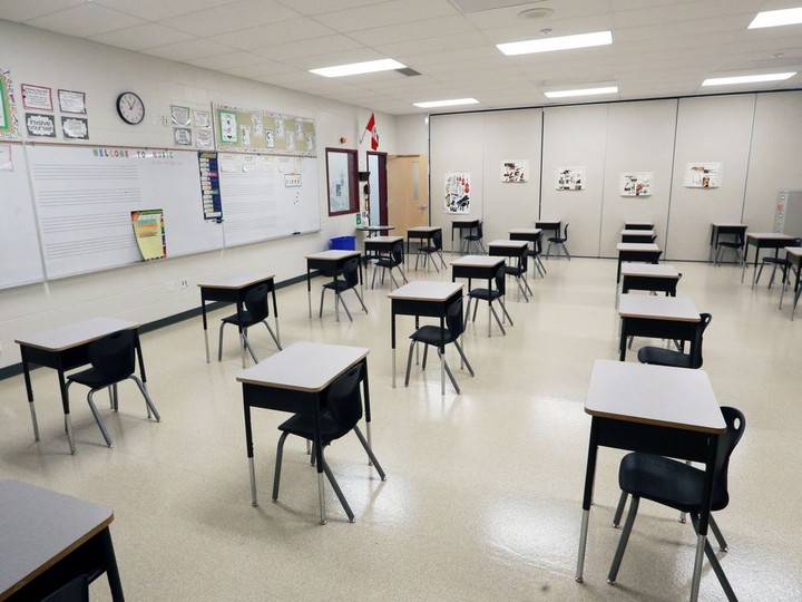  Desks positioned for physical distancing are seen inside a St. Marguerite School classroom in New Brighton on Tuesday, August 25, 2020.