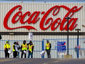 Workers strike at the Coca-Cola bottling plant in northeast Calgary on Monday, March 15, 2021.