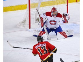 Calgary Flames forward Johnny Gaudreau scores on Montreal goaltender Cayden Primeau during NHL action at the Scotiabank Saddledome in Calgary on Saturday, April 24, 2021. 

Gavin Young/Postmedia