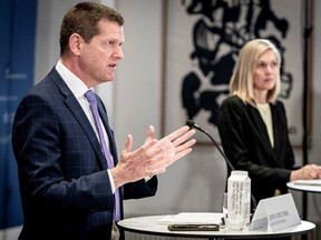 Soeren Brostroem, director of the National Board of Health, and Tanja Erichsen of the Danish Medicines Agency attend a media briefing on the future use of the AstraZeneca COVID-19 vaccine, in Copenhagen, Denmark March 25, 2021.