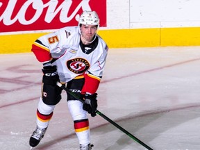 Colton Poolman, now in his first campaign with the Calgary Flames' farm team, is hoping to join his older brother Tucker at the NHL level. (Courtesy of Stockton Heat)