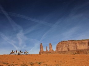 Horseback riding in the wildness of Monument Valley. Courtesy Arizona Tourism ORG XMIT: Transmitted via CleanPix Corp. Asset Management System for pictures, photos and PR marketing files