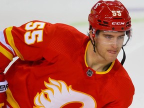 Calgary Flames Noah Hanifin during warm-up before a game against the Edmonton Oilers in NHL hockey in Calgary on Friday February 19, 2021. Al Charest / Postmedia