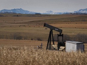 A decommissioned pumpjack is shown at a well head on an oil and gas installation near Cremona, Alta., Saturday, Oct. 29, 2016.