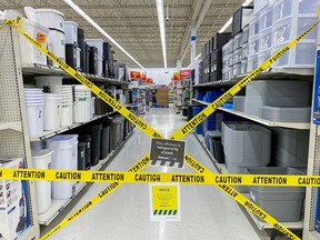 An aisle of non-essential goods is seen cordoned off at a Walmart store, as new COVID-19 measures are imposed on big box stores, in Toronto on April 8, 2021.