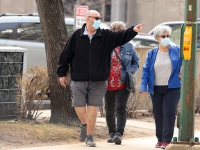 People make their way to the COVID-19 vaccination super site at RBC Convention Centre in Winnipeg on April 11, 2021.