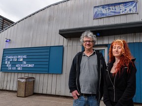 Greg Smith, owner, left,  and Teena Wilson, manager at The Blues Can, pose for a photo on Thursday, May 13, 2021. Azin Ghaffari/Postmedia