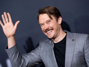 New Zealand actor Michael Dorman arrives for The Invisible Man premiere at the TCL Chinese theatre in Hollywood on Feb. 24, 2020.