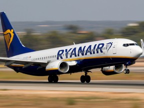 In this file photo, a Ryanair Boeing 737-800 airplane can be seen taking off from the airport in Palma de Mallorca, Spain, on July 29, 2018.