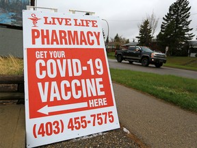 Live Life Pharmacy advertises COVID-19 vaccinations in Fairview on Sunday, May 9, 2021. On Monday vaccination eligibility opens to anyone born in 2009 or earlier.