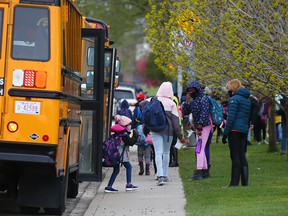 St. Pius X Elementary School students head back to school on Tuesday, May 25, 2021. Schools across Calgary began in-person classes again after several weeks of online study due to the COVID-19 pandemic.