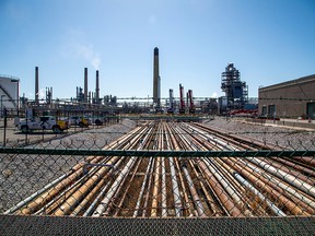 General view of the Imperial Oil refinery, located near Enbridge's Line 5 pipeline, which Michigan Governor Gretchen Whitmer ordered shut down in May 2021, in Sarnia, Ontario, Canada March 20, 2021.  Picture taken through a fence.