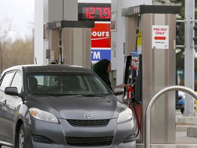 Gas prices as commuters fill up in Calgary on Monday, May 3, 2021.