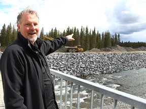 Dick Koetsier, Developer of Gateway Village, poses for a photo near the future development. Gateway Village is a large development that will include a hotel, conference centre, shops, housing and provide a common space in Bragg Creek for festivals and events. Tuesday, May 11, 2021.