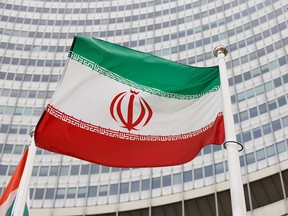 The Iranian flag waves in front of the International Atomic Energy Agency (IAEA) headquarters in Vienna, Austria on May 23, 2021.