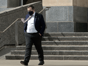 Alberta Premier Jason Kenney leaves the Alberta Legislature on April 8, 2021.