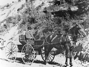 A horse-drawn carriage makes its way through a dirt road on Mission Hill in the early 1900s. Calgary Herald archives photo.
