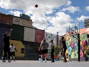 A game of hoops at The Bounce Outdoor Basketball Courts on a warm afternoon downtown. Saturday, May 29, 2021.