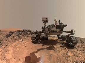 This NASA photo released June 7, 2018 shows a low-angle self-portrait of NASA's Curiosity Mars rover vehicle at the site from which it reached down to drill into a rock target called "Buckskin" on lower Mount Sharp. NASAs Curiosity rover has found new evidence preserved in rocks on Mars that suggests the planet could have supported ancient life, as well as new evidence in the Martian atmosphere that relates to the search for current life on the Red Planet. While not necessarily evidence of life itself, these findings are a good sign for future missions exploring the planets surface and subsurface. The new findings  tough organic molecules in three-billion-year-old sedimentary rocks near the surface, as well as seasonal variations in the levels of methane in the atmosphere  appear in the June 8, 2018 edition of the journal Science.