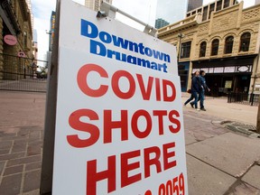 Downtown Drugmart advertises COVID-19 vaccinations on Saturday, May 22, 2021.