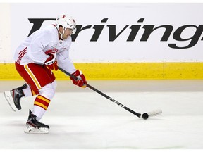 Flames winger Dominik Simon skates with the puck during practice at the Saddledome. Brendan Miller/Postmedia