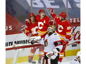 Calgary Flames Johnny Gaudreau scores on Ottawa Senators goalie Anton Forsberg in first period NHL action at the Scotiabank Saddledome in Calgary on Sunday, May 9, 2021. Darren Makowichuk/Postmedia