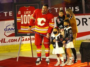 Calgary Flames forward Milan Lucic is honoured for reaching 1,000 NHL games played before taking on the Ottawa Senators at the Scotiabank Saddledome in Calgary on Monday, April 19, 2021.