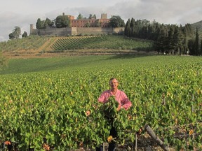 Francesco Ricasoli in the vineyard with the castle in background.
