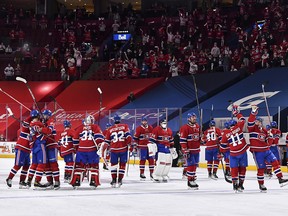 The Montreal Canadiens celebrate their overtime victory against the Toronto Maple Leafs at the Bell Centre on May 29, 2021 in Montreal. The Canadiens are the first NHL team in Canada to host 2,500 fans since the COVID-19 pandemic.