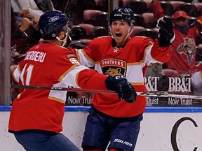 Apr 19, 2021; Sunrise, Florida, USA; Florida Panthers center Sam Bennett (9) celebrates his goal against the Columbus Blue Jackets with left wing Jonathan Huberdeau (11) during the second period at BB&T Center. Mandatory Credit: Jasen Vinlove-USA TODAY Sports ORG XMIT: IMAGN-445617