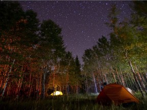A starry night backcountry camping near Abraham Lake in Alberta. Courtesy Wycliffe Canada/Alan Hood