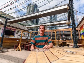 Andrew Brassard, owner of Broken City, poses for a photo at the bar's patio on Wednesday, June 23, 2021. Azin Ghaffari/Postmedia