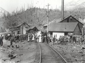 Families wait outside the Hillcrest mine in 1914 for news after the worst mine disaster in Canadian history. Photo courtesy Provincial Archive of Alberta.