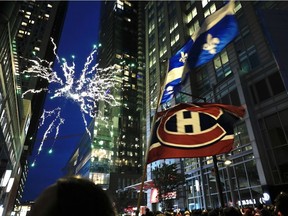 Fireworks are set off as Canadiens fans gather outside the Bell Centre for Game 6 of the third round of the NHL playoff series between Montreal and the Golden Knights on Thursday, June 24, 2021.
