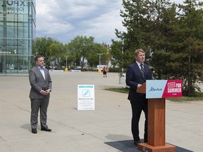 Premier Jason Kenney and Minister of Health Tyler Shandro at the Edmonton Expo Centre on Monday, June 14, 2021. They spoke of a new lottery to help encourage everyone to get the COVID-19 vaccine.