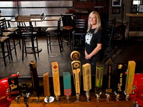 Pig and Duke owner Jo Lowden was looking forward to welcoming customers back inside for dining as the pub got ready on Wednesday, June 9, 2021. Stage 2 of Alberta's reopening plan begins June 10 which will allow indoor dining for up to six people.