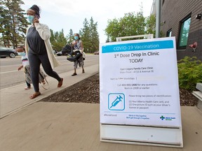 A sign lets passersby know about a drop-in first dose COVID-19 vaccination site at the East Calgary Family Care Clinic in Calgary on Tuesday, June 15, 2021.