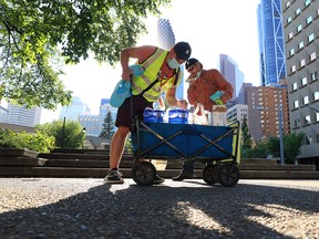 Be The Change YYC Street Outreach team members handed out water, hats and other supplies to vulnerable Calgarians in the downtown core on a sweltering evening as a record-setting heat wave continued in Calgary on June 28, 2021.