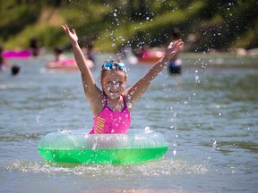 Catalina Tarada, 8, cools off in the lagoon at St. Patrick’s Island on another heat wave day in Calgary, Tuesday, June 29, 2021.