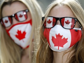 Becca Buist, left, and Kendra Hogg are thrilled with the idea that mandatory masks may soon be a thing of the past.