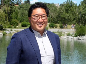 Dr. Jia Hu, a public health expert, poses for a photo in Prince’s Island Park. Saturday, June 26, 2021.