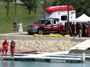 Rescuers are seen on the shore of Mahogany Lake after a 12-year old girl drowned Monday afternoon. Monday, June 28, 2021.