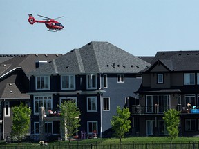 STARS Air Ambulance is seen leaving Mahogany Lake after a girl was in critical condition after being pulled from the lake Monday afternoon. Monday, June 28, 2021.
