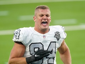 FILE PHOTO: Las Vegas Raiders defensive end Carl Nassib celebrates at the end of the game against the Los Angeles Chargers at SoFi Stadium in Inglewood, California, U.S. Nov. 8, 2020.