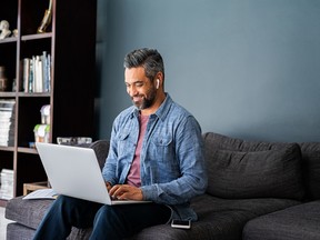 man working on laptop