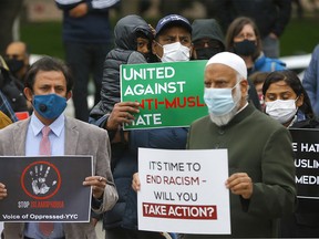 Over 500 people came out to a vigil in honour of the Muslim family killed in a hate crime in London, Ontario at city hall in Calgary on Tuesday, June 8, 2021.